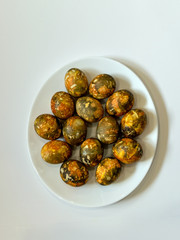 plate with beautiful and colored eggs for Easter