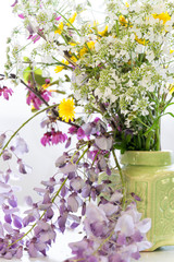 Arranging wildflowers, colorful blossom flowers, seasonal floral themes