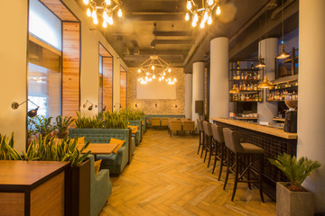 Fototapeta na wymiar Contemporary design in loft style, modern dining place