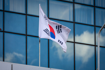 South Korean flag on the background of the building