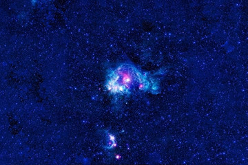 Beautiful blue space with stars and nebulae. Elements of this image were furnished by NASA.