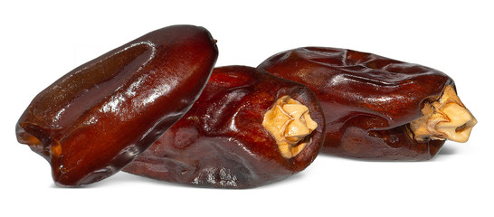 Fresh Medjool dry Dates, close-up, isolated on white background.