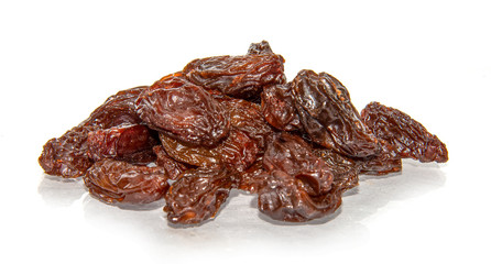 Dried raisins on white background.