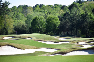 Challenging golf course with many sand bunkers