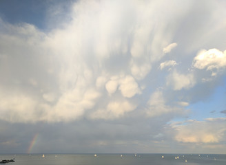 Fototapeta na wymiar Bubbly Clouds Over the Sea