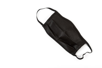 Black medical mask on a white background