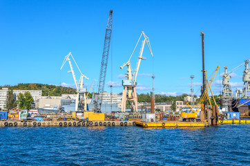 Fototapeta na wymiar Cranes in shipyard, port of Gdynia, Poland.