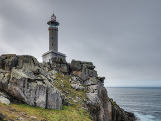 Fototapeta na wymiar Modern shipshape lighthouse of Punta Nariga, Death Coast, Galicia, Spain