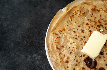 thin pancakes on a stone background