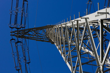 High voltage tower on a background of the sky
