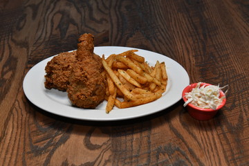 Crispy fried chicken bites with salad. Traditional american food.
