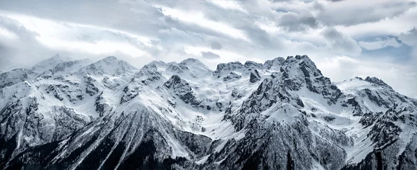  Panoramic view of snowy Caucasus mountain ridge in Karachayevo-Circassian Republic, Russia © lilkin
