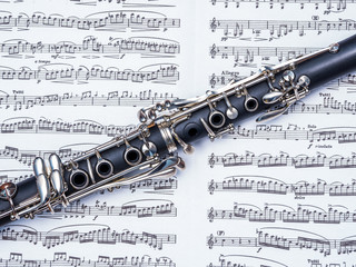 Cropped photo of clarinet over the notes