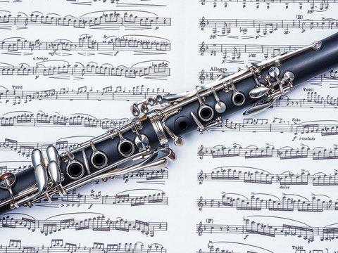 Cropped photo of clarinet over the notes