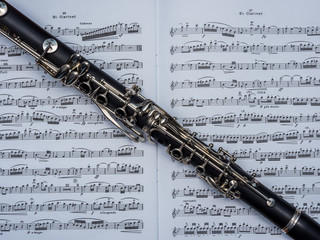 Cropped photo of clarinet over the notes