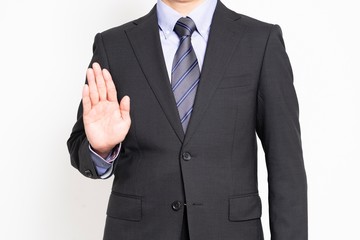 拒否のポーズをする男性