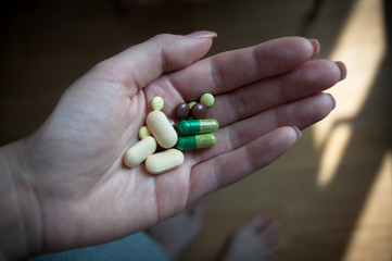 hand holding drugs medical treatment pills depression