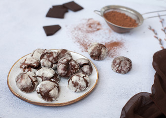chocolate marble cookies brownie on table with ccocoa powder