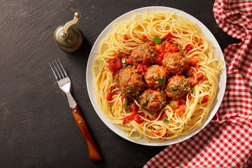 plate of pasta with meatballs, top view