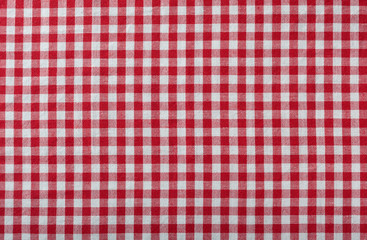 red checkered fabric tablecloth as background