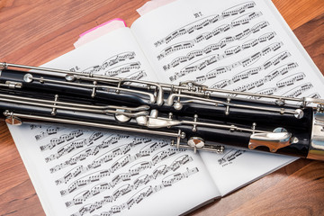 Cropped photo of bassoon over the notes