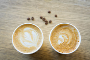 cup of coffee on wooden table
