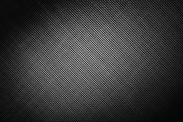 abstract black and white dark background made with grid and spots of light