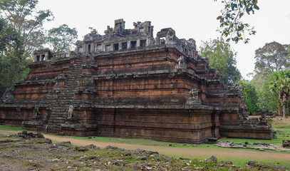 The famous Phimeanakas red sandstone pyramid temple in the jungle near the Angkor Thom Temple (Bayon Temple), a UNESCO World Heritage Site in Siem Reap, Cambodia.