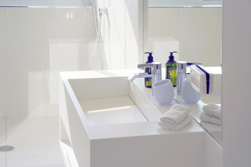 Obraz na płótnie Canvas Modern white bathroom sink with faucet. Interior of bathroom with washbasin and faucet.