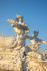 Fototapeta na wymiar A beautiful view of white temple at Chiang Rai, Thailand.