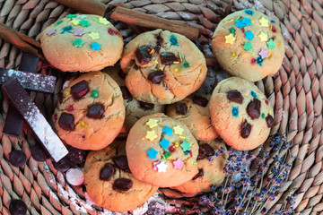 Fototapeta na wymiar chocolate cookies on a dark background. Homemade cookies with chocolate, cinnamon and lavender.