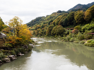Scenic Kiso river valley in early fall with leaves starting to change color - in Agematsu, Nagano prefecture, Japan
