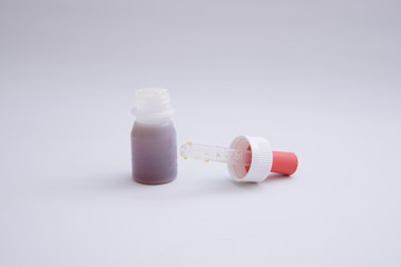 the bottle containing the vaccine