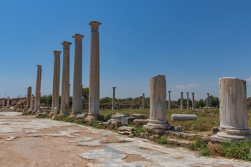 columns of salamis ruins, ancient city north cyprus and blue sky