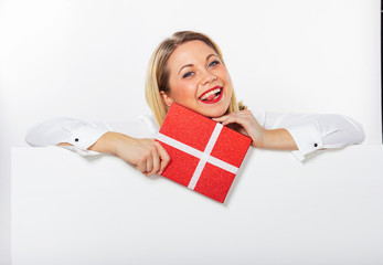 Isolated portrait of a young girl with a gift box in her  hands. Businesswoman with red lips.