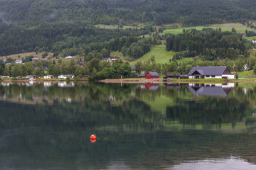small town in the background. norway, selective focus.