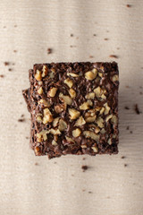 walnut brownies stacked with crumbs