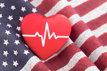 American flag and red heart with pulse