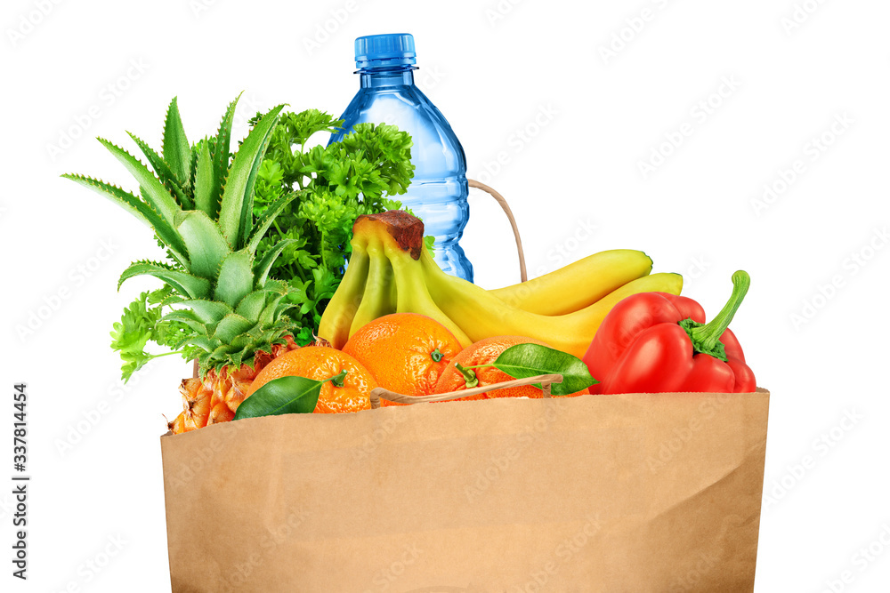 Wall mural grocery bag with fruits and vegetables isolated on white