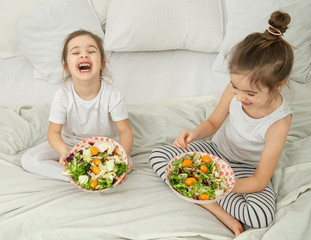 Obraz na płótnie Canvas Healthy food, children eat fruits and vegetables.