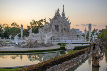 Fototapeta premium A beautiful view of white temple at Chiang Rai, Thailand.