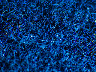 texture of the blue sponge fiber structure. macro photo..