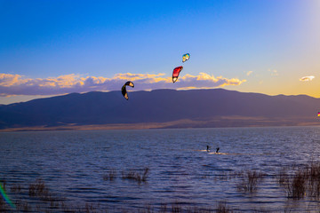 kitesurfing in Utah Lake at sunset