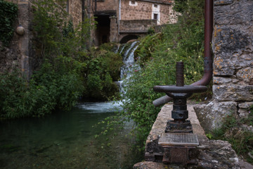 Gate valve for the water system of the Orbaneja del Castillo waterfalls, Burgos, Spain