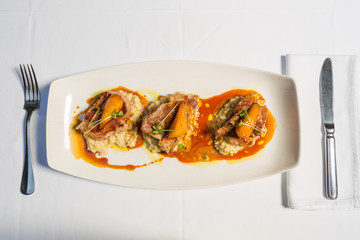 Veal chop without bone served on a plate