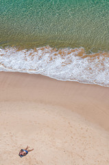 tanning at the beach FN