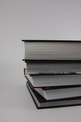 A stack of books on a white background. For the presentation of scientific work and education.
