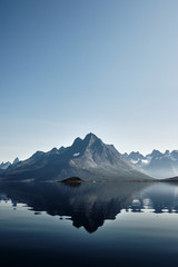 Fototapeta na wymiar Reflection of mountain in tasermiut fjord