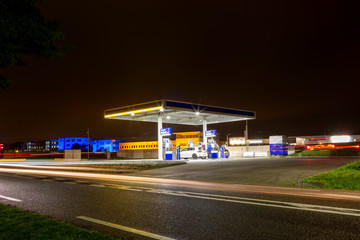 Fototapeta na wymiar Evening at a selfservice gas station at the A44 highway in Sassenheim the Netherlands.