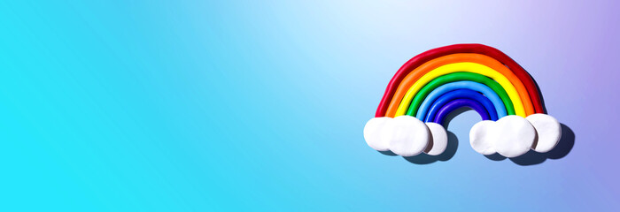 Rainbow and white clouds made with clay - overhead view